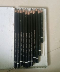 Artist Sketching Pencils
