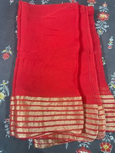 red golden saree