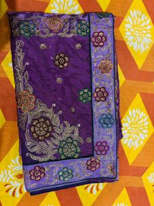 Beautiful Purple Embroidered half net Saree