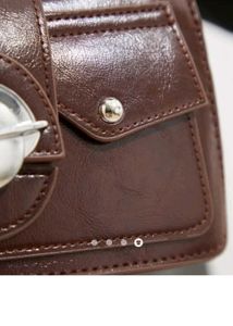 Brown Saturn Detail Bag