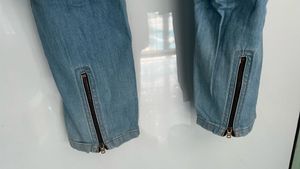 Light Wash Denim Jeans with Zipper Detailing