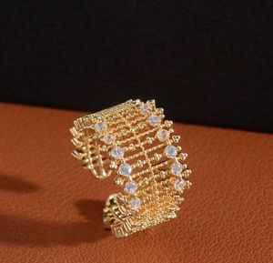 Elegant Gold Tone Ring with Crystals