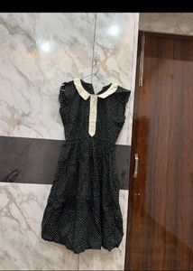 black polka dot mini dress