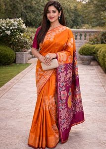 Stunning Orange Silk Saree with Purple Border