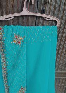 Stunning Embroidered Teal Saree