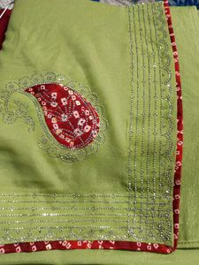 Elegant Lime Green Saree with Red Bandhani Border