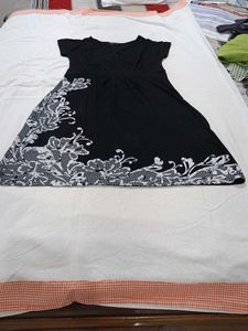 Chic Black Dress with White Lace Detail