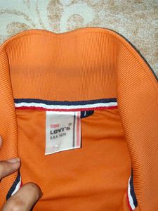 A relaxed Orange Levis T shirt