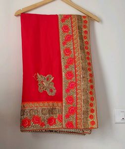 Beautiful Embroidered Red Saree with Orange Blouse