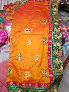 Vibrant Orange Silk Saree with Elephant Motifs