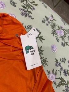 Orange Turtleneck Graphic Top