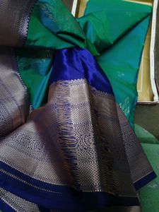 Elegant Teal Saree with Silver Zari Border