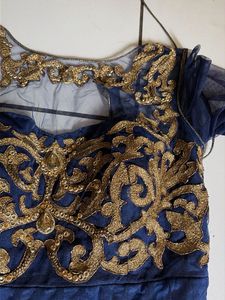 Elegant Navy Blue Gown with Gold Embellishments