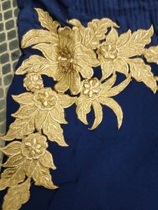 Elegant Navy Blue Dress with Gold Embellishments