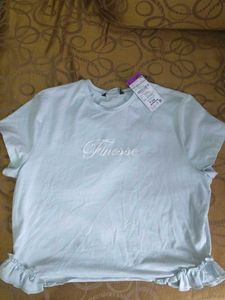 Light Blue "Finesse" Ruffled Hem T-Shirt