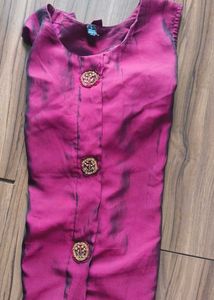 Vibrant Sleeveless Kurti with Golden Buttons
