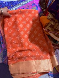 coral color saree