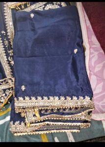 combo of suit and bag