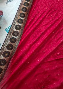 red designer saree with big border
