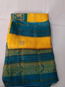 Yellow Saree with Teal Border