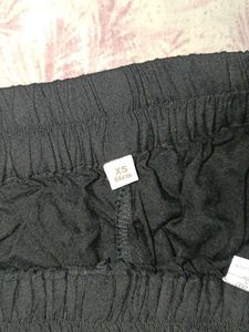 Stylish Black Palazzos with Embellished Cuff