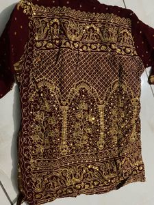 Exquisite Maroon &amp; Gold Embellished Lehenga Choli