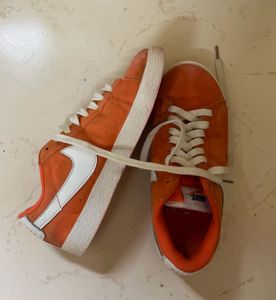 Nike Orange Suede Sneakers