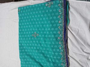 Stunning Teal Saree with Embellished Blouse