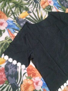 Chic Black Top with White Lace Trim