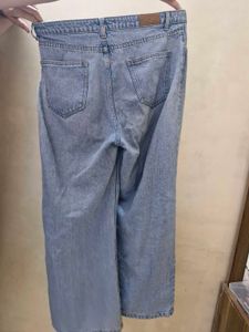 Artistic Face Print Jeans