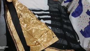 Designer Black And White Saree With Golden Border