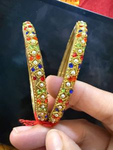 Gold Bangles with Multi-colored Stones