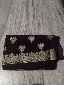 brown shiny saree