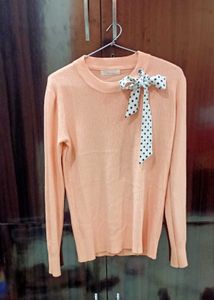 Peach Sweater with Bow