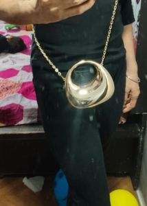 Unique Gold Sphere, red and blue clutch