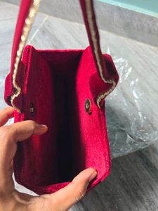 Elegant Red Velvet Clutch with Heart Design