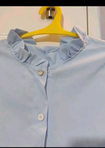 Light Blue Button-Up Ruffle Top