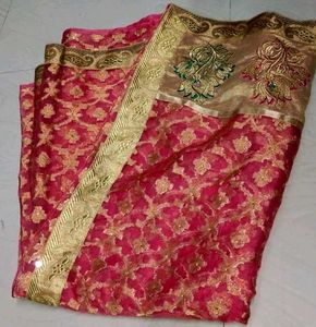 Reddish pink party wear organza tissue silk saree