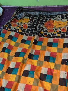 Vibrant Chequered Saree with Floral Motifs