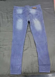 Distressed Light Wash Denim Jeans