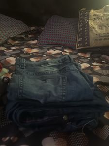 Donation box containing branded clothes - women