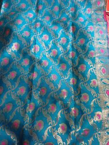 Exquisite Teal Saree with Gold & Pink Motifs