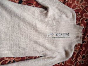 Cozy Knit Sweater with 'Heti Rock Out' Print