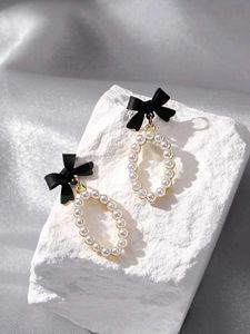 Pearl & Bow Drop Earrings