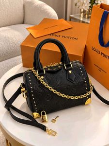 Louis Vuitton Speedy-style studded trunk handbag w