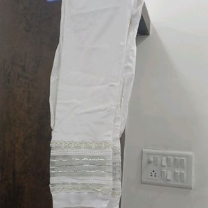 white stretchable pant for suits. size is small and the fabric is stretchable.