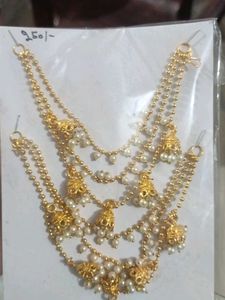 Elegant Pearl and Gold Tone Jhuma Earrings