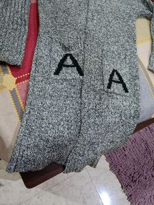 Long Hudded Sweater With Cap Never Used