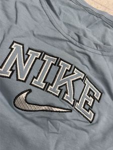 Nike Powder Blue cutesy embroidered drawstring swe