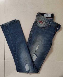Distressed Blue Denim Jeans